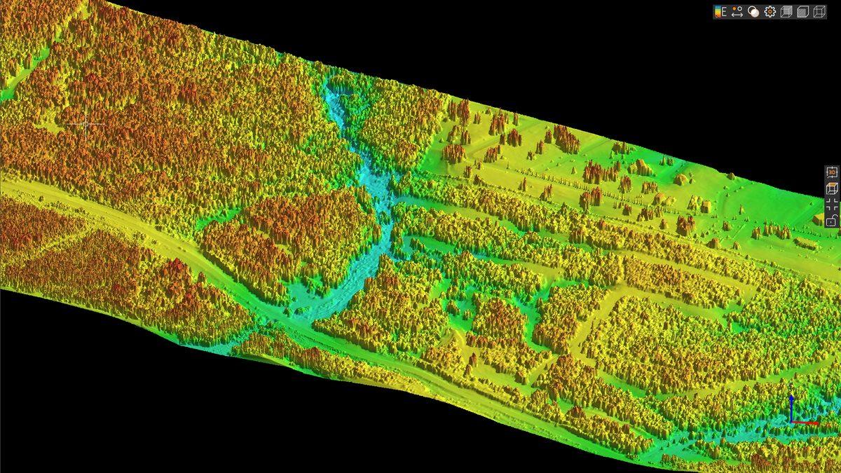 Modelo digital de superficie generado con LiDAR que muestra la altura de la vegetación, edificaciones y el cauce de una quebrada